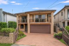  73 Bellevue Parade Allawah NSW 2218 This beautifully maintained full brick property is enhanced by established landscaped gardens. The functional floor plan showcases bright interiors, spacious living areas, high ceilings and a large backyard ideal for entertaining. Conveniently situated between Hurstville and Allawah train stations, it's just a short walk to St George Christian School, Col Jones Swim School, Westfield Hurstville and a variety of restaurants. Key features include: Expansive living and dining area, plus a rear sunroom Generous kitchen with stone bench tops, ample cupboard space and gas cooking Four upstairs bedrooms, including a spacious master with an ensuite, built-in wardrobe and balcony One downstairs bedroom, perfect for use as a home office Main bathroom with a spa bath and shower Floating timber floors throughout the upper level Double lock-up garage with additional driveway parking Large backyard, perfect for entertaining, complete with a garden shed 