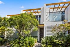  6/483 Crown Street Wollongong NSW 2500 $600,000 Generously proportioned yet low in maintenance, this two-bedroom townhouse offers all the space you crave on a manageable scale. From the moment you approach its striking facade, you'll be captivated by its perfect blend of style and functionality. Spanning two levels, this residence offers a generous sense of space, with sleek bamboo flooring throughout and thoughtfully crafted details in every corner. Both bedrooms feature built-in robes, while the modern gas-equipped kitchen boasts stunning stone bench tops and ample storage. A convenient study nook adds versatility, ideal for students or WFH professionals, while the sun-kissed balcony provides plenty of space for alfresco entertaining and a tranquil potted garden. two-bedrooms with BIRs, double-garage modern kitchen wiht stone bench tops a study nook for students, WFH professionals bamboo flooring, two levels, euro laundry sun-kissed balcony perfect for entertaining 