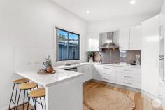  31 Saratoga Avenue Corlette NSW 2315 $1,075,000 Situated in the peaceful and family-oriented suburb of Corlette, this modern residence embodies a harmonious blend of style, comfort, and tranquility. This home offers an inviting and private retreat that feels far removed from the rush of everyday life, yet remains conveniently close to all local amenities. As you enter, you're welcomed into a luxurious space defined by clean white interiors, polished timber floorboards, and sophisticated finishes throughout. Modern downlights enhance the elegant aesthetic, while natural light floods the rooms, creating a warm and airy atmosphere. The thoughtful design promotes an easy, relaxed lifestyle with its seamless flow and open-plan layout. At the heart of the home, the spacious open-plan dining and kitchen area is perfect for both everyday family meals and hosting social gatherings. The kitchen is fitted with high-end stainless steel appliances and premium fixtures, offering both functionality and style for those who love to cook or entertain. Its generous layout allows plenty of room for meal preparation and casual dining, making it a true focal point of the home. The master bedroom is also located on this level. This serene retreat features its own ensuite bathroom and a private balcony, where you can unwind and enjoy the peaceful surroundings. Downstairs, the family-friendly design continues with a second living area, ideal for kids to play or for guests to unwind. The additional three bedrooms are located on this level, offering comfortable accommodation for family members or visiting guests. This space is thoughtfully designed to create a welcoming hub for everyone in the home. Step outside to the undercover entertaining area, which is perfect for alfresco dining, BBQs, or simply enjoying the outdoors year-round. The fully fenced grassed yard ensures safety and privacy, providing an ideal space for children to play or pets to roam. Surrounded by greenery, it offers a peaceful backdrop for relaxation or entertaining. This home is ideally located just a short approx. 3-minute drive from Salamander Bay Shopping Centre, ensuring easy access to a variety of shops, cafes, and essential services. Whether you're running errands or enjoying a leisurely day out, everything you need is within close reach. 