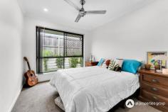  33 Neumann Drive Yarrabilba QLD 4207 $659,000 This home’s kitchen is thoughtfully designed with a 900mm gas cooktop and oven, offering a reliable and high-performing setup for culinary enthusiasts or those who simply enjoy cooking. A stone benchtop provides ample workspace for meal preparation, with additional room for appliances or decor. Numerous cabinets and a generous pantry cabinet ensure easy storage of ingredients, cookware, and kitchen essentials, helping to maintain an organized, clutter-free environment. Positioned to overlook the open plan living and dining area, this layout allows those in the kitchen to stay connected with family or guests, and an air conditioner in this space keeps it comfortable year-round. A separate living room with air conditioning near the entrance creates a distinct space apart from the main open living area. This layout is ideal for those seeking a cozy retreat for quiet relaxation or even a formal sitting area to welcome guests. This room can also serve as a versatile family lounge, media room, or dedicated playroom, adapting easily to various needs without interfering with the activities in the main living area. Each bedroom is fitted with ceiling fans, ensuring comfort during warmer months. The master bedroom, designed as a private retreat, feature s ceiling fan, a walk-in robe for abundant storage, and an ensuite bathroom for added privacy and convenience. The additional bedrooms all have built-in robes, providing organized closet space and. Centrally located, the main bathroom is strategically positioned to serve the other bedrooms and the main living areas efficiently. It includes a shower, bathtub, and a separate toilet, which helps streamline morning routines and enhances functionality for shared use. A well-equipped laundry inside the home provides easy access to the outdoors and includes a large storage cabinet, ideal for household supplies, linens, and cleaning essentials. The laundry’s positioning near outdoor access simplifies tasks like line drying or keeping mudrooms clean after gardening. The alfresco area, covered and complete with downlights and a ceiling fan, serves as a fantastic outdoor entertaining area. Overlooking the fully fenced yard, this space is perfect for hosting gatherings, enjoying outdoor meals, or simply relaxing in a shaded spot while keeping an eye on children or pets playing in the yard. With a double remote-control garage, convenient and secure parking is assured, along with space for additional storage if needed. Key Features: •Built in 2018, this home combines modern design with functional layouts, providing both style and practicality for contemporary living. •The property is equipped with a 6.5 kW solar system, providing an efficient and eco-friendly energy solution to significantly reduce electricity costs. •The kitchen is equipped with a high-quality 900mm gas cooktop and oven, perfect for avid cooks and family meal preparation. A durable stone benchtop adds elegance and offers ample workspace, while abundant cabinetry and a spacious pantry provide plenty of storage to keep the kitchen organized and clutter-free. •Open plan living and dining areas create a central hub for family activities and entertaining. Positioned adjacent to the kitchen, this area allows seamless interaction between spaces. An air conditioner ensures comfort, making it a cozy spot for gatherings or quiet relaxation. •A separate living area located at the front of the home with air conditioning provides a comfortable and versatile space away from the main living areas. Ideal for a formal lounge, home office, or media room, this space offers privacy and a quiet atmosphere, adaptable to suit varying lifestyle needs. •The master bedroom is a private retreat, featuring an ensuite bathroom for convenience, a walk-in robe for ample storage, a ceiling fan further enhances ventilation, making this room comfortable and inviting. •The remaining bedrooms are designed with comfort in mind, each featuring a ceiling fan and built-in robes. These rooms offer organized storage and pleasant airflow, creating cozy, restful spaces for family members or guests. •Positioned for easy access to all bedrooms and main areas, the main bathroom is functional and family-friendly, featuring a shower, a relaxing bathtub, and a separate toilet for added convenience during busy routines. •The laundry is located within the home and includes a spacious storage cabinet, making it easy to manage household tasks. With direct access to the outdoors, it simplifies tasks such as hanging out laundry or quickly stepping in after outdoor activities. •An undercover alfresco area, complete with downlights and a ceiling fan, offers an inviting outdoor space for dining, relaxation, or entertaining. Overlooking the fully fenced yard, this area is perfect for enjoying the outdoors in a shaded, comfortable setting. •The double remote-control garage provides secure parking for vehicles and additional storage space, ensuring practicality and peace of mind. 