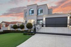  13 Peel Rd Coogee WA 6166 Experience the epitome of luxury coastal living in this masterfully crafted residence by the renowned B Spoke Home Group. Every inch of this exceptional property has been thoughtfully designed to embody elegance and sophistication, making it a true coastal haven for discerning buyers. Step into a world where expansive, light-filled interiors merge seamlessly with unparalleled high-end finishes. The spacious living areas boast breath-taking views that capture the serenity of the surrounding landscape, while the state-of-the-art amenities ensure both comfort and modern functionality. This residence is a sanctuary of indulgence, perfect for those who seek an opulent retreat. Highlights include: • 14+m Saltwater Swimming Pool:  Immerse yourself in pure luxury, complemented by an exquisite alfresco area featuring Velux skylights and stacking doors that blend indoor and outdoor spaces for seamless entertaining. • Brand-New Kitchen:  A culinary masterpiece with sleek black and gold accents, top-of-the-line appliances, and Granite bench top, flows effortlessly into open living spaces, making it the heart of the home. • Master Suite:  A hotel-style haven with an expansive walk-in robe as grand as the room itself. • Formal Lounge and Opulent Staircase:  An elegant entrance leads to a stunning staircase guiding you to the second story, complete with down lights, integrated speakers, and smart home security features. • Upstairs Retreat:  Two generously sized bedrooms with impressive walk-in robes and captivating views, a spacious living area, and a luxurious bathroom with a double vanity and bath. • Security and Privacy:  Enjoy peace of mind with a secure gated entrance and limestone surroundings that ensure exclusivity and privacy. This flawless residence is an embodiment of absolute luxury. Every detail, from the immaculate finishes to the extensive use of premium materials, has been attended to. Viewings are strictly by appointment - come and explore the pinnacle of coastal sophistication for yourself. 