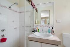  25 Bopeechee Way Port Kennedy WA 6172 $699,000 Set in the tranquil streets of Port Kennedy, this well-presented 4-bedroom, 2-bathroom home is the perfect choice for a growing family. Situated on a generous 448sqm block with lovely street appeal, this home is conveniently located just minutes from local schools, Warnbro Fair Shopping Centre, parks, and public transport. Positioned at the front of the home, the master bedroom boasts a bay window, walk-in robe, private ensuite, and a serene parents' retreat for added comfort. Enjoy a separate lounge at the front of the property for relaxed evenings, plus an expansive open-plan living and dining area with downlights and tiled flooring. Towards the rear of the property are 3 great sized minor bedrooms, which are serviced by a central bathroom and laundry.  Never be short of space with the spacious open-plan dining and living area which is fitted with down lights and tile flooring. The central kitchen offers plenty of bench space and overlooks the meals area and family room, plus you have the added bonus of a games room at the rear of the home  Outside, a large L shaped patio creates the ultimate outdoor entertainment area for gatherings or quiet relaxation.  The grassed yard is perfect for kids and pets to play. Features include: • 4 bedrooms, 2 bathrooms • Formal lounge • Games room • Meals/living and kitchen with shopper's entry • Stone bench tops in kitchen and updated oven and cooktop • Master bed with bay window, ensuite & WIR • Stainless steel oven/rangehood • Ducted evaporative A/C and two split systems  • L shaped gabled/flat patio • Large backyard • Pedestrian access to backyard • Instantaneous gas water heating • Powered shed • 25 solar panels - 6.0 kw 