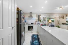  25 Bopeechee Way Port Kennedy WA 6172 $699,000 Set in the tranquil streets of Port Kennedy, this well-presented 4-bedroom, 2-bathroom home is the perfect choice for a growing family. Situated on a generous 448sqm block with lovely street appeal, this home is conveniently located just minutes from local schools, Warnbro Fair Shopping Centre, parks, and public transport. Positioned at the front of the home, the master bedroom boasts a bay window, walk-in robe, private ensuite, and a serene parents' retreat for added comfort. Enjoy a separate lounge at the front of the property for relaxed evenings, plus an expansive open-plan living and dining area with downlights and tiled flooring. Towards the rear of the property are 3 great sized minor bedrooms, which are serviced by a central bathroom and laundry.  Never be short of space with the spacious open-plan dining and living area which is fitted with down lights and tile flooring. The central kitchen offers plenty of bench space and overlooks the meals area and family room, plus you have the added bonus of a games room at the rear of the home  Outside, a large L shaped patio creates the ultimate outdoor entertainment area for gatherings or quiet relaxation.  The grassed yard is perfect for kids and pets to play. Features include: • 4 bedrooms, 2 bathrooms • Formal lounge • Games room • Meals/living and kitchen with shopper's entry • Stone bench tops in kitchen and updated oven and cooktop • Master bed with bay window, ensuite & WIR • Stainless steel oven/rangehood • Ducted evaporative A/C and two split systems  • L shaped gabled/flat patio • Large backyard • Pedestrian access to backyard • Instantaneous gas water heating • Powered shed • 25 solar panels - 6.0 kw 