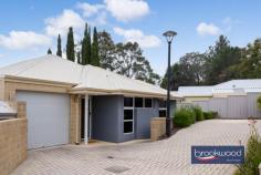 Unit 6/23 Coongan Ave Greenmount WA 6056 $575,000 Offering a perfect blend of modern style, convenience and easy-care living, this impressive villa boasts a Foothills address and the Heritage Trail on the doorstep. Ideal for investors, first-time buyers, FIFO workers or those seeking to downsize, the home is situated within a small, gated complex that ensures privacy and security. A deck for outdoor living and a single garage with a shoppers’ entry bring the final flourishes to an impeccably presented home. 3 bedrooms 2 bathrooms 2017-built brick and iron Central open-plan living Well-appointed kitchen Garage w shoppers’ entry Private elevated deck Small complex gated entry 186 sqm rear of complex Opposite Heritage Trail The well-considered layout includes two spacious bedrooms, a study or third bedroom and two bathrooms. An open-plan kitchen, meals and living area provides plenty of space to relax and entertain, with a sliding door onto the private deck creating an indoor-outdoor flow and expanding the practical living space. Entry to the home reveals light-toned timber laminate flooring and fresh white walls; this luminous modern palette extends across the property, delivering a flexible backdrop with timeless style. Positioned at the front of the home, the main bedroom connects to a versatile space that can be styled as a formal lounge, creating a private retreat for parents. This multi-functional room also lends itself beautifully to a nursery or home office. The carpeted main bedroom features split-system air conditioning, a walk-in robe and an ensuite with a shower, vanity, and WC. The modern kitchen offers stone benchtops, a gas cooktop, an electric oven, a dishwasher and abundant storage, including a built-in pantry. The high ceiling and split-system air conditioning enhance the central living area’s airy, open feel, emphasising its seamless flow to the private deck. Equally suited to family living or shared occupancy, the second bedroom comes with soft carpeting and a built-in robe positioned alongside the family bathroom for a sense of self-contained convenience. A walk-through laundry completes this stylish and functional home, perfect for easy, modern living. A short walk to the local primary school, a quick drive from Midland and steps from hours of walking and riding along the Heritage Trail, this impeccably presented, ideally situated villa is a winner. 