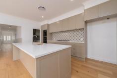  60 Kurrawatha Ave Armidale NSW 2350 $1,350,000 Welcome to 60 Kurrawatha Avenue, a brand-new family home offering modern luxury on a sprawling 1.3 acre block in the prestigious Sandon Park development just 6 minutes from town.  As you step inside the wide and long entrance hall, it welcomes you home to an impeccably built residence featuring four spacious bedrooms, each with walk-in robes. The luxurious master suite includes an oversized ensuite that's both sophisticated and practical. The heart of the home is a vast open-plan kitchen, dining, and living area that flows seamlessly to a large covered outdoor entertaining space, perfect for embracing indoor-outdoor living. A second living area offers a more intimate option, ideal for a formal sitting room or entertainment room, complete with a cleverly integrated office nook. The bespoke kitchen is a culinary dream, boasting a large island bench, European appliances, and an expansive butler's pantry.  Comfort is assured all year round with the Panasonic air touch 9 zone ducted air, Double glazing throughout, Solar system, and a passive solar design that keeps the internal temperature steady no matter the season. Enjoy the expansive views that lead to a stunning natural wetland providing a year round source of entertainment for the family.  Discover 60 Kurrawatha Avenue and create your dream lifestyle in this amazing home, the ideal blend of luxury, space, and tranquillity. 