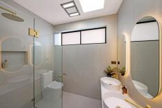  12A Ogmore Court Bankstown NSW 2200 $1,549,950 Welcome to this brand-new, tropical-inspired duplex, tucked away in a peaceful cul-de-sac in the heart of Bankstown. This architecturally designed home is the epitome of modern elegance and functionality, offering the perfect balance of style, comfort, and convenience for families. *Unmatched Design & Livability* Step inside to discover a light-filled open-plan layout, where the centerpiece is the beautifully crafted kitchen. Featuring: - A glass-enclosed walk-in pantry for seamless organization. - A breathtaking 3-meter stone island waterfall bench, ideal for entertaining or casual family meals. - Premium appliances, ensuring a chef's delight in every meal preparation. This space flows effortlessly into the outdoor alfresco area, complete with a covered pergola and a low-maintenance backyard- perfect for year-round entertaining or relaxing with loved ones. *Prime Location* Situated just a 15-minute walk from the upcoming Bankstown Metro train station (completion expected in 12 months), this home puts you within easy reach of everything: shops, schools, clubs, churches, temples, and more! *Key Features* - 5 Spacious Bedrooms: Four upstairs, including a luxurious master suite with an en-suite and walk-in robe. The fifth bedroom/ home office is conveniently located downstairs - ideal for guests or elderly family members. - Luxurious Electric Fireplace: A sleek centerpiece that adds warmth and charm to the living area, perfect for cozy winter evenings. - Sky-Lit Brilliance: Strategically placed skylights ensure an abundance of natural light, creating a bright and airy ambiance throughout the day. This property is not just a home; it's a lifestyle upgrade waiting for its new owners. Don't miss the opportunity to secure your dream family home in this highly sought-after location. 