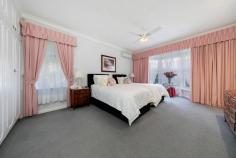  2A Chamberlain Road Willaston SA 5118 Discover a solid brick gem with character and space at 2A Chamberlain Road, Willaston. Situated on a generous 972m2 block, this charming three-bedroom home offers comfort, practicality and an array of features for families and entertainers alike. Step into a residence with 9ft ceilings that amplify the sense of space. The master bedroom is a true retreat, boasting a bay window, ceiling fan, built-in robes, roller shutters, split system air conditioning and a private ambience. Bedrooms two and three are also generously sized each featuring ceiling fans, with bedroom two offering a built-in robe. The expansive living spaces include a large formal lounge and dining room, perfect for hosting guests. A great size rumpus room complete with a bay window provides additional versatile spaces for relaxation or hobbies. The family room and meals area are ideal for everyday living flowing seamlessly into the heart of the home- a well-appointed kitchen with soft-close drawers, a dishwasher, filtered water, ample cupboard space, and a ceiling fan. Catering to the needs of a busy household, the practicality continues with a large laundry featuring abundant storage and a second toilet, leading into the sun room. Comfort is ensured year-round with two split system air conditioners and combustion heating. Security is a priority, with roller shutters on most windows and a fully alarmed security system. Step outside to a beautifully maintained rear garden, accessible from the expansive entertaining area. Immaculate front and rear landscaping enhance the property's curb appeal and provide tranquil outdoor spaces. The oversized double garage with an automatic door ensures ample parking and storage. Located close to schools, major and local shopping centres, public transport and parks, this home also offers convenient access to the Northern Expressway ensuring an easy commute to Adelaide's CBD. Perfectly blending style, space and convenience, 2A Chamberlain Road is a must-see for discerning buyers. Don't miss your opportunity to secure this immaculate home in a prime location. 