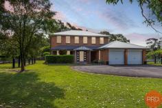  4 Freeman Drive Lochinvar NSW 2321 $1,230,000-$1,280,000 Step onto the sprawling 4252 square metre haven of 4 Freeman Drive in the serene setting of Lochinvar, NSW, where country charm meets spacious family living. This immaculate acreage/semi-rural property offers investors and families an opportunity to enjoy a peaceful lifestyle, complemented by the convenience of local amenities a mere 17-minute drive to Maitland, and the community warmth of nearby shops and cafes. The property captivates at first sight with its incredible street appeal, showcasing a beautiful brick facade set against the backdrop of manicured gardens that promise privacy and tranquillity. The interior echoes this sense of luxury with hardwood, tiled, and carpeted floors that flow seamlessly through the home, adorned with premium fittings and ducted air-conditioning for year-round comfort. Entertain with ease in the open-plan kitchen, living, and dining spaces, where culinary pursuits are a delight in the beautiful chef’s kitchen. It boasts stone benchtops, high-end appliances, two capacious pantries, a breakfast bar, and ample storage solutions. The residence comprises four generously sized bedrooms, each outfitted with ceiling fans, soft carpeting, built-in robes, and ducted air-conditioning. The master bedroom serves as a private retreat featuring an expansive walk-in robe and a luxurious ensuite. The property's practicality is enhanced by a large garage with internal access and additional garage space plus a carport to accommodate up to eight vehicles or various recreational equipment. Outdoor living is a joy with a vast entertainment area and sunroom, perfect for al fresco dining or simply relaxing while overlooking the sparkling pool area. At 4 Freeman Drive, embrace the allure of the countryside with the conveniences of modern living, making this the ideal property to call home. 