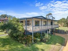  8 Old Waratah Rd Fish Creek VIC 3959 $885,000 Sitting proudly on approx. 1843m2 of land, capturing a rural feel with easy access to everything this popular township has to offer, this upsized property will appeal to anyone looking for space without sacrificing convenience. Inside is light and bright with a wide entertaining deck on two sides providing just the spot to sit and take in the views over the farmland at the rear and to the distant hills beyond the town. The open plan interior is zoned to provide a living room, dining room and lounge area - comfortable all year round with a wood heater plus ducted RC/AC. Centrally located, the stylish modern kitchen includes a huge breakfast bar, wall oven, gas hob, dishwasher, extensive storage including a butlers pantry and utility / storage area. There are five fitted bedrooms including a large master suite with walk in robe and spacious ensuite. Ducted reverse cycle heating and cooling to each of the bedrooms for year round comfort. Modern main family bathroom with spa bath, shower and separate w.c. A central roofed deck includes covered access to the downstairs garage / workshop / studio / games room and under-house storage. The rear garden is fenced and secure with access from Farrell Lane and includes an established vegetable garden. Keep your costs to a minimum with solar power (plus mains) and solar hot water (electric back up). Come and discover the delights of this quirky village with galleries, cafes, award winning Hotel, the Great Southern Rail Trail, community garden and primary school all on your doorstep, and only 15 minutes from the pristine coastline for swimming, surfing and hiking. 