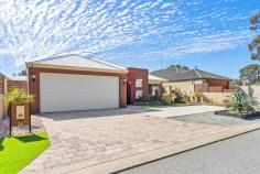  26 Bobtail Bend Wannanup WA 6210 $689,000 Lewis Quayle is proud to present 26 Bobtail Bend to the market, a property designed for comfort, style, and easy living. Set on a low-maintenance 450m² block, this residence is ideally located close to beaches, the Port Boulevard Marina, local schools & shops. Enter through grand double doors into a spacious entrance hall, setting the tone for the elegance found throughout. A second set of double doors leads to a large theatre room, perfect for family movie nights or relaxing with a good book in a quiet, tranquil setting. The master bedroom, situated at the front of the property, boasts walk-in robes and a luxurious en-suite with a double-sink vanity. A separate wing of the home includes three additional double bedrooms, each featuring mirrored wardrobes. This wing also has a well-appointed family bathroom, a separate toilet, a laundry room, and a large linen press, providing convenience and comfort for the entire household. At the heart of the home, the open-plan kitchen is truly a chef's dream. Beautifully designed with generous storage, a center island with a double sink, and a spacious walk-in pantry, this kitchen seamlessly connects to the casual living and dining areas, which include split system air-conditioning for year-round comfort. Outdoors, the covered alfresco area is ideal for entertaining or unwinding with a glass of wine. The private back garden is beautifully landscaped and comes complete with a garden shed for extra storage. Additional features of this home include a master bedroom with walk-in robes and en-suite, three further double bedrooms with mirrored wardrobes, a spacious theatre room or separate lounge, a chef's kitchen with a walk-in pantry and island bench, a double car garage with shopper's entry, an easy-care 450m² block, an alarm system for added security, split system air conditioning, reticulation to both front and rear gardens, and manicured gardens front and back. This exquisite home is ready and waiting for its next lucky owner to enjoy all the lifestyle pleasures it offers. 