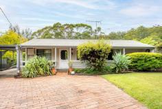  21 Postmans Track Helensburgh NSW 2508 This warm and welcoming home is a delightful blend of charm and character that will captivate you from the moment you arrive. The open-plan living and dining area is bathed in natural light and offers airconditioning for year round comfort. Your Home • Fall in love with the lifestyle this family home has to offer positioned in a whisper quiet location being only a moments walk to local schools and train station. • The modern kitchen, featuring breakfast bar and stainless steel appliances, stands as the heart of the home. • Glass doors seamlessly connect the interior to the spacious alfresco entertaining deck,complete with outdoor kitchen which provides a picturesque view of the lush, low-maintenance, family-friendly garden. • The three bedrooms, all have built in robes and the master suite offers an additional toilet. • The modern family bathroom with yet another separate toilet. • A carport plus ample off street parking ideal for a boat or caravan Your Lifestyle • Centrally located to local schools, train station and bushwalking trails • Picturesque Stanwell Park Beach is less than 10 minutes drive. Enjoy Coastal living without the huge price tag. • This is one of the only remaining areas where you can find a peaceful regional lifestyle less than an hour from Sydney. It offers all of those charming lifestyle benefits that one would associate with small town living:- bushwalking, swimming holes, bike tracks, sporting clubs, cafes and of course plenty of friendly people. • Helensburgh is also an ideal location for commuters with express trains to Sydney and Wollongong as well as direct access to the Highway. Sydney is approximately 60 minutes while Wollongong is 30 minutes. 