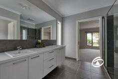  5 Jakobi Court Bunyip VIC 3815 $1,300,000 - $1,400,000 Family Haven on 1 Acre Set on a sprawling 1-acre block, this stunning modern homestead combines luxury living with the charm of country-style tranquility. Located in a quiet, private court, this property offers the perfect blend of space, comfort, and sustainability, making it the ideal choice for those seeking a modern lifestyle in harmony with nature. Offering four bedrooms, each is of generous proportions and feature built in robes and full-length windows with views to the grounds. The primary bedroom distance in design has a walk-in robe and full ensuite bathroom. Central to the design is the stone kitchen with stainless steel appliances and walk in pantry, one can entertain and work seamlessly at the same time. The secondary bedrooms are serviced by a family bathroom. Living areas abound from the formality of the lounge/theatre that can be closed off to the casual and relaxed feel of both the family and rumpus rooms. Each space allows families to gather or retreat. The convenience of ducted heating and split system cooling. The study allows room for one to work from home. A colour filled garden, neatly clipped lawns, together with specimen native trees provide the perfect back drop for kids to roam and room for a future swimming pool. A newly constructed 20x12 m high clearance shed offers four bays, will hold all the toys and more, alternatively one could tinker all day long. Beautifully set, amongst quality housing, the property offers a tremendous platform wanting a semi-rural lifestyle. 