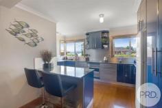  27A Tenth Avenue West Moonah TAS 7009 $665,000 to $680,000 Welcome to 27a Tenth Avenue, a delightful 4 bedroom, 2 bathroom home nestled in the heart of West Moonah. This well maintained residence, constructed in 1966, offers a perfect blend of classic charm and modern convenience, making it an ideal sanctuary for families and those seeking a peaceful lifestyle. This spacious home is set on a 675sqm block and provides ample space for comfortable living. The open plan layout seamlessly connects the living room and dining area, creating an inviting atmosphere for family gatherings and entertaining guests. Enjoy the luxury of four well appointed bedrooms, each offering a cosy retreat. The master suite features an ensuite bathroom for added privacy, while the additional bedrooms are perfect for family, guests, or a home office. Step outside to discover an undercover entertaining area with an outlook over the river Derwent and a beautifully landscaped yard with automated watering system, perfect for outdoor activities, gardening, or simply enjoying nature. The spacious yard provides plenty of room for children to play or for you to unwind in the fresh air. The property boasts open parking spaces for up to four vehicles, ensuring ample room for family and friends. The home features stunning hardwood flooring throughout, enhancing its warmth and character. The living spaces are filled with natural light, creating a bright and airy ambiance. Situated in a quiet, family-friendly neighbourhood, this property is conveniently located near local amenities, schools, parks, and public transport, making it easy to enjoy everything West Moonah has to offer. Whether you're looking for a family home or a peaceful retreat, 27a Tenth Avenue is a must see. Don't miss this opportunity to secure a charming property in a desirable location. 