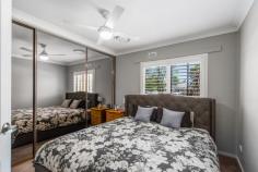  10 Eleebana Crescent Koonawarra NSW 2530 $780,000 - $820,000 Discover this beautifully renovated 3-bedroom family home in the heart of Koonawarra, offering modern living and ultimate privacy with no rear neighbours. Situated on a great-sized block with convenient side access to a double garage, this property is perfect for families or those needing extra storage space. Ideally located just a short walk to local shops, schools, and the picturesque Lake Illawarra foreshore, it provides the perfect blend of convenience and lifestyle. With stylish updates throughout, there's nothing left to do but move in and enjoy. 3 generous bedrooms, one with a BIW Oversized living area with space for the whole family, fireplace Stunning new main bathroom Neat kitchen with adjoining meals area Ducted air conditioning throughout Covered entertaining deck Sunroom overlooking the rear yard Occupying a 671.9m2 block, development potential (S.T.C.A) Double garage with side access, perfect for all of the toys Gated front fence offering great privacy for the kids to play Backing onto a reserve with no rear neighbour Situated a short walk to Lake Illawarra, parks and walking tracks Moments to the local schools, shops and transport 