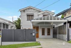  25 Hunter St Greenslopes QLD 4120 A home of versatility and convenience just a short walk from Greenslopes Private Hospital, Greenslopes Mall and transport, this renovated character house presents flexible living and a low-maintenance lifestyle on a 405sqm north-south parcel. Designed with dual living capabilities with two living areas, two kitchens, four bedrooms and three bathrooms, the property is ideal for investors seeking dual income streams, families with multiple generations under one roof, or buyers looking to offset their mortgage by living on one floor and renting the other. Spanning two self-contained levels, the house blends traditional charm and contemporary style with timber floors, casement windows, VJ walls and high ceilings upstairs, and stylish plank flooring, sash windows, and a fresh, modern feel downstairs. Creating central living zones, lounge and dining spaces are featured on both floors, framing the well-appointed kitchens with stainless steel appliances and gas cooktops. These light-filled interiors provide comfort, style, and open-plan living that extends to dual-living accommodation, including a study, one bedroom and one bathroom/laundry downstairs, and three bedrooms and two bathrooms on the upper floor. Accessible from both levels, the rear alfresco patio presents a private entertaining retreat with plenty of space for parties, peaceful relaxation and an outdoor BBQ kitchen. Overlooking the secure backyard with manicured lawns and established gardens, there is spectacular room for active kids, resident pets and family sporting matches. Set behind an electric driveway gate, the property features a double carport and additional parking for a boat/caravan. Additional property highlights: - Two living areas; two kitchens; study; four bedrooms; three bathrooms - Stainless ovens and gas cooktops in both kitchens; dishwasher in downstairs kitchen - Rainfall showers and floor-to-ceiling tiles in all bathrooms; one bathroom with a bathtub - Alfresco patio accommodating an outdoor kitchen and accessing the backyard - Electric front gate; double carport; boat/trailer parking; 2.8x2.6 shed - Split system air-conditioning; LED downlights Situated in central Greenslopes, this location offers ultra-convenience in an inner-city pocket. Greenslopes Private Hospital is 500m away, Greenslopes Mall is 350m from your door, and additional shopping, dining and supermarkets await at Stones Corner Village, South City Square and Coorparoo Square. Local bus services and the SE Busway provide quick commutes into the city, 6.8km from your door. You can also take advantage of the SE Bikeway and Pacific Motorway for easy travel. Children are in the Greenslopes State School and Cavendish Road State High School catchments, top private colleges are accessible in minutes, and students can easily access Griffith University, QUT Gardens Point and UQ. 