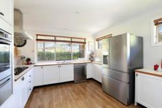  108 Stuarts Road Katoomba NSW 2780 $1,300,000 - $1,400,000 Nestled on a serene 1-acre block, this beautifully designed home offers the perfect blend of privacy, sustainability, and modern convenience. With half the property featuring cool-climate gardens and the other half natural bushland, this retreat is ideal for those seeking tranquility and a connection to nature. Thoughtfully equipped with eco-friendly features and a versatile layout, it's the ultimate haven for relaxed living. Located in a peaceful area with bush walks at the end of the street, this property is truly a rare find. Breakdown of Features: Three spacious bedrooms plus a versatile fourth room for use as a study, office, or music room All-steel frame construction with insulation in the ceiling, internal, and external walls Laminated doors and windows for enhanced security and energy efficiency Open-plan living with a slow combustion fire, natural gas heating, and reverse-cycle air conditioning Modern kitchen with gas oven and cooktop, dishwasher, and ample storage Luxurious bathroom with a spa bath 45,000L water tank for household use plus a 10,000L tank with fire hose for fire safety Solar-powered living with 27 panels and a Tesla battery system Double garage with electric roller door for convenience Landscaped gardens with sprinkler systems, a glasshouse, and plenty of space for outdoor enjoyment Peaceful, private location with bush walks just steps away This property combines sustainable living with unmatched privacy and modern comforts. Don't miss your chance to make this unique retreat your home.  