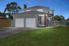  11 Seaquesta Court Frankston VIC 3199 $780,000 - $848,000 Unfolding its grandeur with 335sqm (approx.) of private surroundings, this four bedroom residence presents a striking rejuvenation and proposed subdivision, combining family functionality with an enticing modernisation, to deliver sanctuary-like living within the heart of the esteemed Lakewood Estate. Charmingly introduced by a welcoming frontage and paved driveway, the home immediately introduces a warm neutral palette and engineered floorboards upon opening, delivering an invitation to the free-flowing yet zoned, family domain. With numerous living spaces ensuring space for every age group, the home encourages relaxed entertaining and comfortable everyday living, anchored by the stone-finished kitchen comprising glass splashback, entertaining island bench and SMEG wall oven. Organic textures and rich hues balance the abundance of natural light introduced by surrounding windows, whilst an open fireplace provides comfort in those chillier months. A generous mudroom, powder room and laundry, complete the ground floor design, before heading upstairs. A simple yet sophisticated first floor layout offers tranquil sleeping quarters, with a central corridor revealing a grand master suite including parent's retreat, ensuite and WIR, and three additional bedrooms (all with built-in robes) serviced by a main bathroom with feature standalone tub. Enjoy the whisper of fresh air, or an exclusive space for outdoor entertaining, as glass sliders in bedroom two and the master suite reveal a covered balcony, ideal for intimate entertaining. Mimicking the same dimensions, an additional covered patio extends from the ground floor living room, welcoming a seamless blend of indoor/outdoor living, whilst concrete paths envelop the home, guiding exploration across the low-maintenance yard. Additional features comprise: Gas ducted heating, split-system air conditioning, under stair storage, recently installed carpets, freshly painted, recently upgraded light fittings, VJ panelling in living/meals area, 2000L water tank, garden shed, and double garage. Be the envy of your friends in this sensationally versatile abode, ideal for those seeking 'lock and leave' or investment potential, a base for an active lifestyle, or a low maintenance permanent address. Positioned within the sought after Lakewood Estate, the home boasts proximity to local schools, shops, recreational reserves and easy freeway access. 