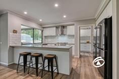  5 Jakobi Court Bunyip VIC 3815 $1,300,000 - $1,400,000 Family Haven on 1 Acre Set on a sprawling 1-acre block, this stunning modern homestead combines luxury living with the charm of country-style tranquility. Located in a quiet, private court, this property offers the perfect blend of space, comfort, and sustainability, making it the ideal choice for those seeking a modern lifestyle in harmony with nature. Offering four bedrooms, each is of generous proportions and feature built in robes and full-length windows with views to the grounds. The primary bedroom distance in design has a walk-in robe and full ensuite bathroom. Central to the design is the stone kitchen with stainless steel appliances and walk in pantry, one can entertain and work seamlessly at the same time. The secondary bedrooms are serviced by a family bathroom. Living areas abound from the formality of the lounge/theatre that can be closed off to the casual and relaxed feel of both the family and rumpus rooms. Each space allows families to gather or retreat. The convenience of ducted heating and split system cooling. The study allows room for one to work from home. A colour filled garden, neatly clipped lawns, together with specimen native trees provide the perfect back drop for kids to roam and room for a future swimming pool. A newly constructed 20x12 m high clearance shed offers four bays, will hold all the toys and more, alternatively one could tinker all day long. Beautifully set, amongst quality housing, the property offers a tremendous platform wanting a semi-rural lifestyle. 