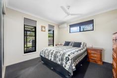  18 Monterey Way Calliope QLD 4680 $595,000 If you are looking for a modern 4 bedroom, 2 bathroom family home in a quiet family friendly neighbourhood then look no further than 18 Monterey Way, Calliope. A unique feature of this home is the privacy, with bush-land at the side and rear of the property. This beautifully maintained residence built in 2007, with a large kitchen, separate living areas, double lock up garage and in-ground pool is on the market. At first glance, the home's curb appeal is immediately evident, with a neatly designed front lawn that sets the tone for the rest of the property. As you approach the house, the solid double timber doors at the entryway create an inviting atmosphere, offering a glimpse into the well considered interior. Adjacent to the spacious entry area, is the cosy media room, neatly separated from the living area with soft carpeting and split air-conditioning. Further towards the heart of the property, you'll find the well-designed kitchen, living, and dining areas, all seamlessly connected for modern living. The kitchen is generously sized, with ample cupboard space and a large central bench that not only provides plenty of prep room but also doubles as a convenient breakfast bar. A separate pantry offers additional storage plus a plumbed-in refrigeration ensures all your needs are met. With an electric stove and oven, this kitchen is perfect for whipping up your favorite meals, whether you're preparing a casual breakfast or hosting a dinner party. Relaxing in the living room is a true pleasure, with cool, easy-to-maintain tiled floors. The space is perfect for unwinding after a long day, with a ceiling fan ensuring year-round comfort. This area also provides direct access to the three bedrooms, bathroom, and the outdoor entertaining space. Whether you're enjoying a family movie night or simply lounging with loved ones, the living room offers everything you need. All of the bedrooms are generously sized, accommodating a queen bed and are carpeted for added comfort. Each room features built-in wardrobes and ceiling fans for convenience, while three of the bedrooms are also fitted with split air conditioning, ensuring a cool and comfortable environment year-round. The master bedroom is particularly inviting, offering a cool, breezy atmosphere with a lovely view of the outside greenery. It boasts a spacious double mirrored built-in wardrobe and a private ensuite, with the added comfort of split air conditioning. The modern bathroom is designed for both relaxation and convenience. It features a separate, deep bath perfect for a long, soothing soak, while the separate shower offers a practical solution for those busy mornings when you're on the go. The covered entertainment area, easily accessible from the living room, is the perfect spot for socialising with friends and family. Whether you're enjoying an afternoon swim in the pool or firing up the BBQ for a casual cookout, this outdoor space is ideal. The backyard offers plenty of privacy, with a peaceful bush outlook providing a serene backdrop. It's a secure and spacious area, making it perfect for the kids to play safely while you relax and entertain. AT A GLANCE Security screened throughout Two separate living areas Private backyard & side of property with bush-land Lovely quiet street surrounded by quality established homes Close to school, shops and park In-ground pool Side access - room for boat or caravan Two separate sheds (one powered for your workshop and the other for pool supplies & equipment). 