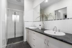  18 Claret Avenue Virginia SA 5120 Nestled in the heart of Virginia, 18 Claret Avenue offers the perfect blend of comfort, convenience, and family living, making it an ideal retreat for those seeking space and modern amenities. Virginia, just a short 35-minute drive from the city and with easy access to Port Adelaide, Semaphore, and the scenic Copper Coast, offers a lifestyle that's both peaceful and practical.. Designed with families in mind, this home boasts a spacious 5-bedroom layout, ensuring there's room for everyone. Each of the generously sized bedrooms is equipped with built-in or walk-in wardrobes, while the master suite is a true retreat, complete with a his-and-hers ensuite and a spacious walk-in robe. Bedrooms 3, 4, and 5 also feature walk-in robes, making storage effortless. The flow of natural light throughout the home adds to its inviting atmosphere, and the modern tones enhance the overall contemporary appeal. For families who enjoy both private and communal spaces, this home has been thoughtfully designed with an abundance of living areas. A separate formal lounge provides a perfect parents' retreat, while the open-plan living area is ideal for entertaining, featuring a well-appointed kitchen, meals area, and additional family or games room. This space is versatile, whether it's a spot for the kids to play or a space to host friends over a pool table. The kitchen itself is a standout, with a large island breakfast bar, pendant lighting, a 900mm oven and 5-burner stove, a dishwasher, and a spacious walk-in pantry - perfect for those who love to cook or entertain. This home continues to impress with its exceptional storage options and modern comforts, including reverse cycle ducted heating and cooling to ensure year-round comfort. Outside, the property shines even brighter, offering a substantial 1200 sqm allotment that truly has something for everyone. The large decked gable entertaining area is designed for outdoor living, featuring a natural gas outlet and TV provisions, ideal for enjoying long evenings with family and friends. For those with hobbies or needing additional storage, the property also includes a garden shed and a double garage under the main roof, with convenient side access leading to a 6m x 9m high-clearance shed, complete with a concrete floor and 3-phase power - perfect for any project or additional storage needs. The kids and family pets will have plenty of space to run and play on the large lawn area, and with the addition of a vegetable patch, you'll have everything you need to live sustainably. Irrigation to both the front and back gardens ensures that maintaining the beautiful landscape is a breeze. And to top it all off, the home is powered by a 7.5kw solar system, helping to reduce energy bills and contribute to a more eco-friendly lifestyle. What we love: Executive residence - 5 good size bedrooms Master with his and hers walk in robe and ensuite Bedrooms 3, 4 and 5 with walk in robes Open plan kitchen, meals living and games room Separate formal lounge room / theatre room Modern bathroom and laundry Ducted reverse system heating and cooling Solar Power Extensive decked entertaining area 6m x 9m high rise shed with concrete floor and 3 phase power Established gardens and garden shed Double carport with roller door Side driveway with side gates and drive through access 