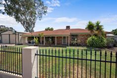  4 Cotter Street North HANNANS WA 6430 $489,000 A great opportunity to get into the property market is with this fabulous property in Hannans. With enough room for the whole family, consisting of 4 bedrooms and two modern bathrooms. The spacious kitchen has lots of storage, and an island bench, perfect for busy families! The open plan living area has beautiful bay windows, with a fire place and ducted air conditioning throughout. The huge yard has a double garage with roller doors, great for vehicles or set it up as a workshop, plus a smaller garden shed for storage. An electric gate at the front for security, all set on a 914m2 block. For viewings call Martina 0417 180 103. • Brick and Tile Home • 4 Bedrooms • 2 Modern Bathrooms • Spacious Kitchen w Island Bench • Open plan dining and living area • Double Garage with Roller Doors • Yard Access for additional vehicles • Garden Shed • Block Size 914m2 • Council Rates 24/25 $2898.07 