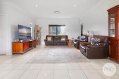 788 Moore Creek Road Tamworth NSW 2340 This stunning five-bedroom, two-bathroom home boasts ample space and prime location, perfect for families or those with peaceful and simple living in mind. The open-plan layout seamlessly connects the living, dining, kitchen and alfresco areas, with an additional media room, creating a perfect space for the entire family to enjoy. The modern kitchen is equipped with ample storage space and an island bench. Offering a convenient three-way main bathroom and five generously sized bedrooms, containing built in wardrobes with the master suite encompassing a walk-in robe and an ensuite. Other features include ducted reverse cycle air-conditioning throughout, a wood fire place a single lock up garage and an alfresco area, perfect for all your entertaining needs. But that's not all, with a large four bay garage with a double carport and two 20,000L rainwater tanks plus the bonus of having town water available, all whilst being situated on 1.64ha of land with established gardens and fruit trees. Conveniently located just minutes from the CBD, close to schools, shops and health services.  