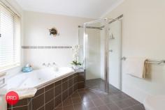  2 Eyre Street Bungendore NSW 2621 $1,175,000 - $1,225,000 If your wish list for a new property includes a heated inground pool, extra shedding, a large 5 bedroom ensuite plus rumpus home and stunning gardens on over 1200 sqm, your search will hopefully end at this property. Ideally located at the end of a quiet street, you will find this much loved family home with great street appeal. Immaculately presented and fastidiously maintained, this property is a credit to the owners who have had it since new. The family friendly floorplan will easily cater for large families without a problem. The layout includes a segregated master suite at the front, a large centrally located kitchen, 3 spacious living zones, 4 other bedrooms with built in robes, 3 way bathroom and large laundry. Supplementing the 3 generous living zones, the owners have converted the garaging under the roofline to a great games room for the pool table however it can still be used as garaging if required. They have been able to do this as there is additional garaging with side access which provides accommodation for 2 vehicles with plenty of room left for storage and workshop requirements. Year round comfort is assured with a combination of ducted gas heating and a large centrally located cooling system. An 8 kw solar system will certainly provide some relief from those nasty power bills which is always a bonus. For those who love to entertain, just imagine the options here. A beautiful solar heated inground salt water pool will provide endless hours of fun throughout the summer months and really gives this property that resort style feel. A covered outdoor entertainment area flows seamlessly from inside and is an entertainers delight. To complete this amazing package there are also fruit trees, raised vegetable gardens, greenhouse and much more. Be quick to avoid disappointment as this is a standout property. 