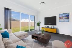 36 Bendeich Drive North Rothbury NSW 2335 Welcome to 36 Bendeich Drive, a stunning 2018 McDonald Jones built family home nestled in the beautiful suburb of North Rothbury. This spacious and modern property offers the perfect balance of comfort and lifestyle, making it the ideal place to call home. Only minutes from Huntlee shopping centre, local schools, parks and within a 4mins drive to the Hunter Expressway and a 15min drive to reach the Hunter Valley Vineyards, this one makes everyday living a breeze! Immaculately presented, this house boasts a generous floor plan with multiple living areas, providing plenty of space for the whole family to relax and unwind. The open-plan kitchen and dining area is the heart of the home, featuring sleek appliances, ample storage, and a breakfast bar for casual meals. The adjoining living room is perfect for entertaining guests or enjoying quiet nights in with loved ones. With four bedrooms, including a spacious master suite with a walk-in wardrobe and ensuite, there is room for everyone to have their own space. The remaining bedrooms are spacious and light-filled, offering built-in wardrobes and easy access to the main bathroom. Ducted air conditioning, high ceilings and plantation shutters throughout are only some of the additional extras this home has to offer inside! Outside, the property continues to impress with a large low maintenance backyard, perfect for children to play or for those who love to entertain. The covered alfresco area is ideal for hosting summer barbecues or enjoying a morning coffee. An additional concreted area is located at the rear of the property that can be used as a second entertainment area or perfect to place a shed on. 