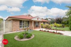  2 Eyre Street Bungendore NSW 2621 $1,175,000 - $1,225,000 If your wish list for a new property includes a heated inground pool, extra shedding, a large 5 bedroom ensuite plus rumpus home and stunning gardens on over 1200 sqm, your search will hopefully end at this property. Ideally located at the end of a quiet street, you will find this much loved family home with great street appeal. Immaculately presented and fastidiously maintained, this property is a credit to the owners who have had it since new. The family friendly floorplan will easily cater for large families without a problem. The layout includes a segregated master suite at the front, a large centrally located kitchen, 3 spacious living zones, 4 other bedrooms with built in robes, 3 way bathroom and large laundry. Supplementing the 3 generous living zones, the owners have converted the garaging under the roofline to a great games room for the pool table however it can still be used as garaging if required. They have been able to do this as there is additional garaging with side access which provides accommodation for 2 vehicles with plenty of room left for storage and workshop requirements. Year round comfort is assured with a combination of ducted gas heating and a large centrally located cooling system. An 8 kw solar system will certainly provide some relief from those nasty power bills which is always a bonus. For those who love to entertain, just imagine the options here. A beautiful solar heated inground salt water pool will provide endless hours of fun throughout the summer months and really gives this property that resort style feel. A covered outdoor entertainment area flows seamlessly from inside and is an entertainers delight. To complete this amazing package there are also fruit trees, raised vegetable gardens, greenhouse and much more. Be quick to avoid disappointment as this is a standout property. 