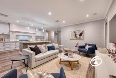  15 Axnick Rise Officer VIC 3809 $1,180,000 - $1,280,000 Elegant. Luxurious. Unforgettable. No stone has been left unturned in crafting this breathtaking family home, from its commanding street presence to the impressive backyard retreat. Perched on a generous 700sqm (approx.) allotment, this one-of-a-kind residence offers a thoughtfully designed floor plan that blends elegance with functionality. Step inside, and you'll immediately be captivated by soaring ceilings and a wide, inviting hallway that sets the stage for the sophistication within. A formal living room provides a peaceful space to unwind before moving into the heart of the home—a stunning open-plan kitchen, dining, and family zone. The kitchen is an entertainer’s dream, featuring premium stone benchtops, soft-close drawers, a tiled splashback, top-tier appliances, and an enormous butler’s pantry. Smart storage solutions include a walk-in linen cupboard with a hidden storage area, perfect for a cellar or extra pantry space. Four spacious bedrooms provide built-in robes, with the primary suite offering a private retreat complete with a luxurious ensuite featuring a double vanity and a walk-through wardrobe. The family bathroom mirrors the same attention to detail, highlighted by a sleek freestanding bath. Multiple living spaces offer versatility for every occasion, including an upstairs retreat with panoramic views, a study nook, and electric skylights that enhance natural light throughout the day. The oversized garage is equally impressive, with soaring ceilings, additional storage under the stairs, and internal access. Side access adds practicality, with ample space for a caravan, boat, or trailer. Outdoors, an expansive deck creates the perfect setting for alfresco dining and entertaining while enjoying breathtaking views. Perfectly positioned on the hilltop opposite Hicks Reserve, this home is just moments from parks, cafés, schools, public transport, and the M1. Built by renowned builder Smarthomes and featuring an array of premium upgrades, this property delivers the ultimate lifestyle package. Inspect today to experience it for yourself! 