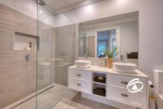  15 Axnick Rise Officer VIC 3809 $1,180,000 - $1,280,000 Elegant. Luxurious. Unforgettable. No stone has been left unturned in crafting this breathtaking family home, from its commanding street presence to the impressive backyard retreat. Perched on a generous 700sqm (approx.) allotment, this one-of-a-kind residence offers a thoughtfully designed floor plan that blends elegance with functionality. Step inside, and you'll immediately be captivated by soaring ceilings and a wide, inviting hallway that sets the stage for the sophistication within. A formal living room provides a peaceful space to unwind before moving into the heart of the home—a stunning open-plan kitchen, dining, and family zone. The kitchen is an entertainer’s dream, featuring premium stone benchtops, soft-close drawers, a tiled splashback, top-tier appliances, and an enormous butler’s pantry. Smart storage solutions include a walk-in linen cupboard with a hidden storage area, perfect for a cellar or extra pantry space. Four spacious bedrooms provide built-in robes, with the primary suite offering a private retreat complete with a luxurious ensuite featuring a double vanity and a walk-through wardrobe. The family bathroom mirrors the same attention to detail, highlighted by a sleek freestanding bath. Multiple living spaces offer versatility for every occasion, including an upstairs retreat with panoramic views, a study nook, and electric skylights that enhance natural light throughout the day. The oversized garage is equally impressive, with soaring ceilings, additional storage under the stairs, and internal access. Side access adds practicality, with ample space for a caravan, boat, or trailer. Outdoors, an expansive deck creates the perfect setting for alfresco dining and entertaining while enjoying breathtaking views. Perfectly positioned on the hilltop opposite Hicks Reserve, this home is just moments from parks, cafés, schools, public transport, and the M1. Built by renowned builder Smarthomes and featuring an array of premium upgrades, this property delivers the ultimate lifestyle package. Inspect today to experience it for yourself! 