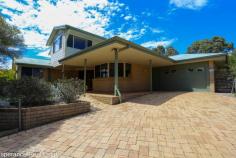  22 Barron Close Pink Lake WA 6450 $920,000 Nestled on 5,042sqm of beautifully landscaped grounds, this exceptional property boasts water-wise gardens with full reticulation and a prime position overlooking the 13th green of Pink Lake Golf Course. Home Features: • Spacious open-plan living with a large kitchen, breakfast bar, and servery • Elegant double timber door entry leading to a lounge with reverse cycle air conditioning and tile fire • Master suite with His & Hers robes and a private ensuite featuring a spa • Two additional bedrooms, a second bathroom, and laundry on the lower level • Rich timber staircase leading to an expansive games room with a timber bar & pool table (included!) • 4th bedroom plus a separate sunroom for year-round relaxation Outdoor & Additional Features: • 13m x 8m powered workshop – ideal for projects or extra storage • 68,000L rainwater storage • Immaculate, low-maintenance gardens with full reticulation Enjoy the perfect blend of space, serenity and stunning views in this unique home.  