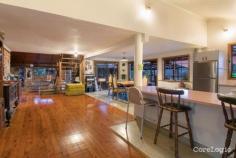  425 Friday Hut Rd Possum Creek NSW 2479 $2,900,000Now is the time to seize your dream of an idyllic life and make it a reality, rarely are acres like this offered for sale in highly sought after Possum Creek, a perfect setting just minutes from Bangalow and a short drive to Byron Bay. This 15 acre property affords privacy, peace and tranquility in a private setting overlooking arable paddocks fronting the Wilson River. The original owners of this four bedroom timber home have been there for nearly 50 years and reluctantly present their much loved property for sale. The red cedar home is nestled on hilltop cleared acres with elevated views to the Nightcap Ranges, the pristine waterway and riparian forest below. It offers four bedrooms, two bathrooms, a snug lounge, kitchen and open plan living area plus a second living space. There is a magnificent deck of grand proportion connecting the two wings of the home forming the true hub and heart of the home. Timber verandahs frame the views, an open fireplace creates warmth and security, timber polished floors and timber panelling define character and charm and raked ceilings enhance the country homestead feel. For the horse enthusiast you need look no further. The property offers covered yards, stable, tackroom and numerous shed and storage facilities. Established trees and gardens surround the home which is well protected and private from Friday Hut Road.. There are gentle paddocks with ample shade trees and water can be pumped from the Wilsons River. This is a home full of potential in an iconic location offering privacy, proximity and peace. Dreams do come true so seize the day! 