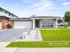  55 Stevens Dr Oran Park NSW 2570 Discover Your Dream Home in the Heart of Oran Park! Built by the highly reputable Wisdom Homes, this quality residence offers a perfect blend of modern design, solid construction, and thoughtful features, ideal for families and investors alike. Key Features: Spacious Living: 3 generously sized bedrooms, including a main bedroom with a walk-in robe and ensuite, plus a well-appointed family bathroom. Oversized Double Garage: Ample room for vehicles and storage, complete with a dedicated storage section. Entertainment Ready: The low-maintenance backyard features a large outdoor bench with hot and cold water-perfect for hosting family gatherings and BBQs. This space is ideal for creating lasting memories with loved ones. Light-Filled Open Plan Design: High ceilings and abundant natural light create a warm and inviting atmosphere throughout the home. Solid Foundation: Built on a tiered concrete slab designed to support a second story, offering future growth potential. Eco-Friendly Features: Equipped with 12 solar panels to reduce energy costs. Comfort Year-Round: Enjoy an oversized ducted air conditioning unit with two zones, providing immediate cooling or heating. Gas heating in the media alcove adds extra comfort. Convenient Access: Potential side access for a box trailer, plus plenty of parking at the front and corner of the property. Prime Location: Positioned on a quiet corner block in a family-oriented street, just minutes from local shops, schools, public transport, and the soon-to-be-operational Badgerys Creek Airport. Quality Craftsmanship: A testament to superior building standards with thoughtful finishes and enduring style. This growing area is perfect for families, offering a quiet yet convenient lifestyle close to all the essentials. With its high-quality build and family-focused design, this home is ready for you to move in and enjoy. Don't miss this exceptional opportunity to secure a home in Oran Park's thriving community. 