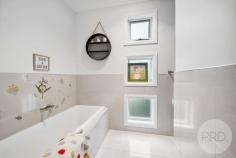 1 Larra Place Bourkelands NSW 2650 $749,000 A fantastic location and layout ideal for families, this modern Bourkelands home will impress you from the get go. Set on a 663m2 block in a quiet cul-de-sac, looking over parklands that are home to an adorable kangaroo family - functionality was at the forefront of the builders mind when designing this stunning residence. On entry you will feel the amount of space with an open plan living/dining area off the modern kitchen. There is also a separate family room with access to the outdoor area which is perfectly appointed for the kids to play and the adults to entertain. The master bedroom boasts a walk in robe and ensuite while down a level you'll find the remaining three bedrooms, all with built in wardrobes and the family bathroom. Additional features include ducted evaporative cooling and gas heating, double remote lock up garage with internal access, ducted vacuuming system and shutters on the external windows, to name a few. With everything thought of and nothing left to do, you could be in your new home in time for the 2025 school year! 