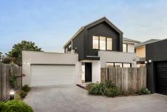  3/108 Fortescue Avenue Seaford VIC 3198 $985,000 - $1,083,500 A genuine work of contemporary art defined by its meticulous craftsmanship and flawless presentation, this near-new 3-bedroom townhome has been carefully crafted to create a sophisticated coastal lifestyle that surpasses all expectations, captivating with its flawless design and exquisite attention to detail. An architectural facade, engineered Oak floors and high square-set ceilings introduce a grand layout with light flourishing into every corner, centred around vibrant living and dining spaces with magnificent integration to its adjacent deck and yard. Refined materiality persists inward, with stone counters over a designer ebony kitchen, where supporting Bosch elements and a walk-through pantry emphasise its enhanced refinement. Dual walls of stacker doors frame private gardens to the rear while extending life to the northeastern deck, welcoming the morning sun with a pergola overhead. The ground floor's main bedroom with a designer ensuite and a fitted walk-in robe provides options for living at all ages, with two additional bedrooms on the upper floor around a vast second lounge and family bathroom. A prudent modern insertion in a quiet coastal pocket echoes the broadening vogue of its location, moments from Kananook Tennis Club and Reserve, Kananook Creek walking trails, Kananook Station, buses, and the beautiful foreshore, with Seaford Village, freeway access, Kananook Primary and Frankston CBD all within a brief drive. Additional features include split-system air conditioning, LED downlights, premium blinds, a full-sized laundry and lower-level powder room, and a double garage. 