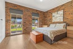  21 Jacana Avenue Moama NSW 2731 $600,000 to $629,000 Located in the heart of Moama is this delightful three bedroom home that culminates in a peaceful, sun-drenched garden with roses reminiscent of a relaxed country setting. With a cosy sense of space, serenity, the free-flowing and airy layout introduces open plan living/dining, which includes a great wood heater. The kitchen is a standout with its modern very stylish brand new fit out with quality appliances, including a dishwasher, rangehood and a built- in pantry. The main living area is light and bright and features an open fireplace, and stylish flooring throughout. The home also has a split system. All three bedrooms all have built in robes and there is a separate laundry and central bathroom with a bath and shower. The property also features excellent side access for those that have a caravan, trailer, boat or extra cars. The bluestone extends to a single lock up garage with a small shed at the rear. Enjoy your delightful rear garden under the veranda. This is an excellent solid bluestone home with an appealing street frontage with excellent side access in a great location. Once you see it you will want to own it. Recent Updates • Brand new very stylish kitchen with excellent appliances and pantry • New Flooring • Painted ceilings - doors, wardrobes and door frames • New gutters around the home • New Posts under the veranda • New hot water service • New Cistern in Toilet • New Blinds • Replaced glass in shower 