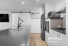  29 Ghost Gum Blvd Banksia Grove WA 6031 $700,000 to $800,000 Team Demo is proud to present this stunning 4-bedroom, 2-bathroom family sized property. This is the first time that this home has ever hit the market. The current original owners have so many precious memories & have loved their time here since 2005. Buyers searching for a property that has space for the whole family & a great work from home space for hairdressers, beauty or consulting are urged to act fast to avoid missing out. Features & benefits include: * Exposed aggregate drive * Portico & front door entry * Home theatre / formal lounge (hot & cold water & waste capped — has been used as hair salon by current owners) * Master bedroom with walk in robe & ensuite with shower, vanity & WC * Open plan family & meals areas * Stunning kitchen with breakfast bar, dishwasher, gas cooktop & electric oven * Further coffee station / fitted cabinets to meals area * Shoppers access from the double garage * Bedrooms 2,3 & 4 all with built in robes * Family bathroom with bath, shower & double sinks * Laundry with linen storage & WC * LED lighting * Reverse cycle air conditioning for year-round comfort * Solar electricity system * Freshly painted with neutral décor * Amazing outdoor entertainment areas with huge, pitched roof patio & alfresco with zip track blinds, beautiful decking & ceiling fan. This is the ultimate space for BBQ’s & family gatherings. * Large, established back garden with plenty of room for a pool * Side access from the drive for car, trailer, boat, camper trailer etc * Double garage * Large 607sqm block Situated conveniently close to bus routes, schools, parks, shopping centres & all local attractions & amenities, this is the property you have been searching for! 