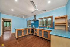  78 Macilwraith Street Manoora QLD 4870 $449,000 Set on a generous 678m² corner block, this classic two bedroom low-set Queenslander is full of character and promise. If you have an eye for potential, this home is a rewarding opportunity-with a little love and care, it will transform into a glittering gem. From the moment you step inside, you'll be captivated by the original charm of yesteryear. Stunning high ceilings, beautiful timber floorboards, set the stage for a home brimming with warmth and personality. Key Features: Two spacious bedrooms - one featuring a built-in wardrobe and air conditioning Living & Dining - a light-filled front living room seamlessly adjoins the dining space Kitchen - fitted with a gas cooktop and a space to transform into large walk-in pantry that could double as additional storage Bathroom - includes a shower, toilet, and timber flooring Tandem car accommodation - providing ample space for vehicles or additional storage Outdoor Laundry - conveniently located with easy access to the backyard Established Private Gardens - mature trees and lush greenery create a peaceful, secluded retreat, set back from the street Patio Area to front of the home - perfect for relaxing or entertaining outdoors Convenient Location - Close to Everything! Located approximately 10 minutes to Cairns City, this property offers incredible convenience with a wide range of essential amenities and lifestyle attractions nearby: Cairns Hospital & Medical Centres - Just a short drive away for peace of mind Shopping & Retail - Close to Raintrees Shopping Centre, 10 minutes to Cairns Central Shopping Centre, minutes to Edge Hill Village, and local specialty stores Cafés & Dining - A fantastic selection of cafés, restaurants, and takeaway options nearby Schools & Childcare - Within easy reach of quality schools, including Cairns State High School, Edge Hill State School, and Trinity Bay State High Parks & Recreation - Minutes from Centenary Lakes, the Cairns Botanic Gardens, and the Esplanade Lagoon Public Transport - Well-connected with bus routes nearby for easy commuting The possibilities here are endless-whether you're looking to restore its former charm, renovate to your taste, or create your dream home, this property is a rare find in convenient location. 