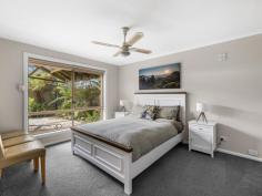  4 Box Ave Sandy Point VIC 3959 $860,000-$910,000 Nestled within approximately 1,075 square meters of lush, fully fenced gardens and designed to offer a seamless blend of indoor and outdoor living, this home is perfect for those seeking an escape from the hustle and bustle. Every room overlooks the enchanting garden, where mature trees create a natural canopy, inviting local birdlife and providing ample shade. Enjoy year-round alfresco entertaining under a covered BBQ area, ideal for gathering with friends or savouring peaceful moments in nature. The light-filled sunroom, complete with a cozy wood heater, flows into a welcoming living room. Well-appointed kitchen, featuring stainless steel appliances, generous storage, and a breakfast bar that connects to the practical tiled dining area. Three comfortable fitted bedrooms, the master with walk-in robe and private powder room. The central bathroom provides a touch of luxury with a spa bath and separate shower, the adjoining laundry grants access to roof storage for added convenience. Additional features include a versatile garage/workshop with wood heater, kitchenette, and an attached bathroom-perfect for hobbies, guest accommodation, or extra storage. Practical amenities include a woodshed, lockup storage shed, bore, and tank water. With ample parking for multiple vehicles, a boat, or jetski, this picturesque coastal haven is perfect for full-time living or carefree holiday escapes. Embrace a lifestyle where comfort, nature, and convenience come together in harmony. 