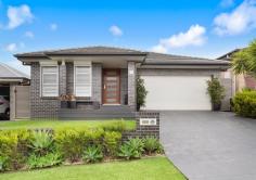  8 Abbey Street Stream Hill NSW 2526 $1,190,000 - $1,250,000 A glamorous family home ready to move in and enjoy presents here at 8 Abbey Street, Stream Hill. This stunning single level Masterton - New Living home is packed with additional extras throughout providing plenty of space and comfort all year round. The functional design provides a seamless flow between indoor/outdoor living making entertaining friends and family easy. The gorgeous outdoor area suits all occasions and is the perfect setting to relax and enjoy the company of those you love. This will be the home they nominate for all gatherings as they kick back in the covered alfresco or in the swim spa while the pizza oven cooks dinner. Internally the home has a functional floorplan that is suitable to all demographics making day to day living easy. The quality fixtures and fittings throughout present the opportunity to live a life of luxury that you deserve. Located in a family friendly estate with a gorgeous escarpment backdrop, this is the home where you can start making memories as soon as you move in. Located just minutes to Dapto CBD, Schools, Shops, Public Transport, Freeway Access and with local beaches, Wollongong City and Shellharbour City all just 10 Minutes away, this is the home you must inspect. FEATURING • 4 Bedrooms - Master with walk in wardrobe and ensuite • Large well appointed kitchen with butlers pantry • Spacious open plan design • Media room • Ducted air conditioning • Gas - LOPI Cypress fireplace • Covered entertainment area with electronic shutters • Swim spa • Solar panels - 24 panels/6.6kw system • Pizza oven • Water features • Double garage with polish stone flooring 