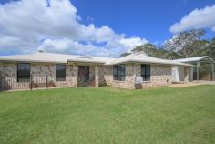  58 Col Brown Avenue Clinton QLD 4680 $739,000 Exciting New Listing: This beautifully renovated lowset brick home has 4 bedrooms, 2 bathrooms, double garage, and it offers all the modern comforts and style, and presents as a new home. Set on a large fully fenced corner block with a 12m x 9m shed, with a mezzanine floor, and a 4T Vehicle Hoist. Perfect for the home mechanic or car enthusiast, and ideal if you have a boat or caravan because there's plenty of side access. It's a move-in ready impressive home, just waiting for the lucky new owners to sit back and enjoy! Attention to detail is impeccable with the inside fully repainted, new lighting throughout, modern tiles, brand new kitchen, new bathrooms and fittings, and the entire home has brand new white blinds, and new air conditioners. So, when you step inside, the first reaction is, 'Wow' this is nice!! It's an open plan living, dining and kitchen area. The kitchen has a double sink, pantry, plenty of bench space, soft close drawers and cupboards, and an electric cooktop. There's even a coffee nook, or it can be a designated area for your jug and toaster. The Master bedroom is air conditioned and has a built-in robe, and an ensuite tiled to the ceiling, while the other 3 bedrooms are also air conditioned, with built-in robes, while the main bathroom has a separate shower & bath, tiled to the ceiling and a separate toilet. Some of the other features that this home has to offer is that there are security screens throughout, and no carpet either which is a bonus. There is plenty of room to add a swimming pool if desired later, and the home backs on to bushland so it's very private. Conveniently located just minutes from shopping centres, schools, the CBD, and popular restaurants. 