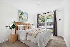  2/107 Yuille Street Frankston South VIC 3199 $630,000 - $690,000 Situated at the rear of only two, this private and sun-drenched home embraces a low-maintenance lifestyle in a coveted FHSZ location, just a stone's throw from Pratt Reserve. Meticulously renovated with heart, it showcases a range of thoughtful upgrades, ensuring a comfortable living experience throughout its bright and airy single-level design. Waterproof Hybrid flooring enhances the practicality of this entire two-bedroom layout, where both sunlit bedrooms maintain their privacy in a peaceful rear position. A designated living room with gas wall heater and exterior access complements a light-filled meals zone, while the adjoining kitchen makes entertaining seamless thanks to all-new electric appliances, stylish timber benchtops, and ample cabinetry including a built-in bar/coffee station. This stylish home boasts a modern bathroom complete with a separate tub and shower, a spacious laundry with external access, a secure rear yard offering ample play space, and a single carport with an adjoining service area. Enjoy convenient access to the Frankston Foreshore via Sweetwater Creek, as well as proximity to Overport Primary and Frankston High School, and reliable public transport options. Ideally located within easy reach of Frankston Hospital, Monash University, and Bayside Shopping Centre. 