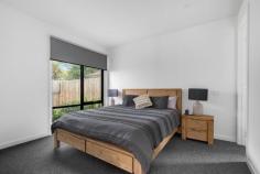  3/108 Fortescue Avenue Seaford VIC 3198 $985,000 - $1,083,500 A genuine work of contemporary art defined by its meticulous craftsmanship and flawless presentation, this near-new 3-bedroom townhome has been carefully crafted to create a sophisticated coastal lifestyle that surpasses all expectations, captivating with its flawless design and exquisite attention to detail. An architectural facade, engineered Oak floors and high square-set ceilings introduce a grand layout with light flourishing into every corner, centred around vibrant living and dining spaces with magnificent integration to its adjacent deck and yard. Refined materiality persists inward, with stone counters over a designer ebony kitchen, where supporting Bosch elements and a walk-through pantry emphasise its enhanced refinement. Dual walls of stacker doors frame private gardens to the rear while extending life to the northeastern deck, welcoming the morning sun with a pergola overhead. The ground floor's main bedroom with a designer ensuite and a fitted walk-in robe provides options for living at all ages, with two additional bedrooms on the upper floor around a vast second lounge and family bathroom. A prudent modern insertion in a quiet coastal pocket echoes the broadening vogue of its location, moments from Kananook Tennis Club and Reserve, Kananook Creek walking trails, Kananook Station, buses, and the beautiful foreshore, with Seaford Village, freeway access, Kananook Primary and Frankston CBD all within a brief drive. Additional features include split-system air conditioning, LED downlights, premium blinds, a full-sized laundry and lower-level powder room, and a double garage. 