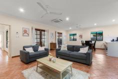  13 Bowerbird Loop Djugun WA 6725 $699,000 What are you looking for in a family home? Is it space or style? Location or liveability? Whatever it is, you'll find it, and more, in this beautifully crafted 3 bed, 2 bath Roebuck Estate home. As unique as it is stunning, this home offers modern, functional living, in a sought-after estate location. And it doesn't stop there. An entertainer's dream, you'll discover feature-packed living spaces both inside and out and a flexible floorplan perfect for families at all stages of life. From the front, the home boasts great street appeal thanks to established tropical gardens, towering mature palms and lush green lawn. The large double carport has room for two vehicles with plenty of additional stone and driveway parking, and gated side access to secure shaded parking at the rear. Feature-packed from front to back, the light and bright interior boasts spacious, tiled open-plan living and dining with light and bright paintwork and plenty of natural light. At the heart of the home is the modern central kitchen with beautiful white gloss cabinetry, stone benchtops, stainless steel appliances and big breakfast bar. Other key features include the separate study, large main bathroom with separate shower and bath, outdoor laundry with W/C, large lock-up storeroom for added storage options, air-conditioning, ceiling fans, modern downlights, window blinds, security screens and more. The home itself boasts 3 generous sized bedrooms - all with built-in robes - including the big front Master that comes with an office, large built-in robe, private ensuite and access to the deck. Designed to maximise Broome's outdoor lifestyle, two expansive raised decks offer endless entertaining space, one complete with dual ceiling fans and a built-in bar - guaranteed to impress your guests. A separate gated deck gives you access to your very own shaded private spa, perfect for sitting out and enjoying under the stars, with an outdoor shower to rinse off after. Easy-care gardens keeps maintenance to a low while there's more than enough room to sink a pool and a separate lock up shed for all your tools and toys. Located just a short walk from Roebuck Primary, the kids will be minutes from school, and you'll be within a short drive of both Chinatown and Cable Beach. 