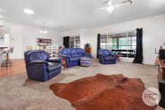  11 Duncan Street Woolomin NSW 2340 $640,000 Welcome to a home where lifestyle meets comfort, designed to cater to every family member's needs and aspirations. This large, four-bedroom home is a sanctuary of spacious living, boasting expansive open spaces that flow seamlessly from the internal to the external areas. Whether it's the generously proportioned bedrooms that promise restful retreats or the vast communal areas perfect for family gatherings and entertaining guests, this home has it all. With abundant natural light streaming through large windows, every room offers a sense of serenity and warmth. The surrounding outdoor space is ideal for relaxation, play, or hosting barbecues, ensuring everyone finds their happy place. Here, every day feels like a getaway, making it the perfect home for any family seeking both tranquility and a vibrant lifestyle. This beautiful home features four bedrooms, each equipped with built-in wardrobes to maximize storage and organization. The master bedroom stands out with its ensuite and direct access to the enclosed back verandah, offering a private retreat. Thoughtfully designed for a growing family, the home provides ample storage and a layout that perfectly accommodates their needs. The heart of the home is an expansive, open-plan living area with a charming country-style kitchen, complete with a walk-in pantry that seamlessly connects to the laundry. The practicality of the design is highlighted by external access directly from the carport. With the inclusion of solar panels and a three-zone ducted air conditioning system, the current homeowners enjoy energy savings while maintaining comfort. Externally, the home boasts a front verandah overlooking manicured lawns and gardens, presenting a gorgeous rural aspect. The practicality of the property is further enhanced by a drive-through access to a large shed with great height, perfect for storing the family boat or caravan. This versatile shed also includes a workshop area, mezzanine floor, lock-up storage, and a convenient toilet. Water security is well addressed with ample soft water storage and a bore that assists with external water needs and can be connected to the home if required. Additionally, back lane access and a section of the back of the block provide the perfect spot that could be fenced off for furry friends, ensuring their secure enjoyment of the outdoor space. Woolomin is a charming rural town that offers a tranquil lifestyle surrounded by picturesque landscapes. Situated approximately 36km from Tamworth, residents of Woolamin enjoy the benefits of close proximity to a larger urban center. Tamworth, renowned for its country music scene, provides a robust array of opportunities and amenities, contributing to job security in various sectors. Tamworth is equipped with excellent educational facilities, offering a range of schools to cater to different age groups and educational needs. Additionally, Tamworth supports health and well-being with its comprehensive healthcare services, including a modern, well-equipped hospital. This makes it an ideal place for families seeking a balance between rural tranquility and urban accessibility. Chaffey Dam is conveniently located just 6km from Woolomin, offering a perfect getaway for weekend leisure. The dam is a haven for those who enjoy fishing, swimming, and engaging in classic family activities. With its serene waters and scenic surroundings, it provides an ideal backdrop for relaxation and recreation. Families can cast their lines and enjoy a day of fishing, while the inviting waters entice swimmers of all ages. The ability to easily access such a versatile outdoor destination enhances the appeal of living in Woolomin, ensuring that weekends are filled with fun and cherished memories. 