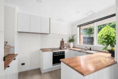  2/107 Yuille Street Frankston South VIC 3199 $630,000 - $690,000 Situated at the rear of only two, this private and sun-drenched home embraces a low-maintenance lifestyle in a coveted FHSZ location, just a stone's throw from Pratt Reserve. Meticulously renovated with heart, it showcases a range of thoughtful upgrades, ensuring a comfortable living experience throughout its bright and airy single-level design. Waterproof Hybrid flooring enhances the practicality of this entire two-bedroom layout, where both sunlit bedrooms maintain their privacy in a peaceful rear position. A designated living room with gas wall heater and exterior access complements a light-filled meals zone, while the adjoining kitchen makes entertaining seamless thanks to all-new electric appliances, stylish timber benchtops, and ample cabinetry including a built-in bar/coffee station. This stylish home boasts a modern bathroom complete with a separate tub and shower, a spacious laundry with external access, a secure rear yard offering ample play space, and a single carport with an adjoining service area. Enjoy convenient access to the Frankston Foreshore via Sweetwater Creek, as well as proximity to Overport Primary and Frankston High School, and reliable public transport options. Ideally located within easy reach of Frankston Hospital, Monash University, and Bayside Shopping Centre. 