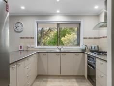  4 Box Ave Sandy Point VIC 3959 $860,000-$910,000 Nestled within approximately 1,075 square meters of lush, fully fenced gardens and designed to offer a seamless blend of indoor and outdoor living, this home is perfect for those seeking an escape from the hustle and bustle. Every room overlooks the enchanting garden, where mature trees create a natural canopy, inviting local birdlife and providing ample shade. Enjoy year-round alfresco entertaining under a covered BBQ area, ideal for gathering with friends or savouring peaceful moments in nature. The light-filled sunroom, complete with a cozy wood heater, flows into a welcoming living room. Well-appointed kitchen, featuring stainless steel appliances, generous storage, and a breakfast bar that connects to the practical tiled dining area. Three comfortable fitted bedrooms, the master with walk-in robe and private powder room. The central bathroom provides a touch of luxury with a spa bath and separate shower, the adjoining laundry grants access to roof storage for added convenience. Additional features include a versatile garage/workshop with wood heater, kitchenette, and an attached bathroom-perfect for hobbies, guest accommodation, or extra storage. Practical amenities include a woodshed, lockup storage shed, bore, and tank water. With ample parking for multiple vehicles, a boat, or jetski, this picturesque coastal haven is perfect for full-time living or carefree holiday escapes. Embrace a lifestyle where comfort, nature, and convenience come together in harmony. 