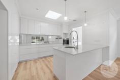  1 Larra Place Bourkelands NSW 2650 $749,000 A fantastic location and layout ideal for families, this modern Bourkelands home will impress you from the get go. Set on a 663m2 block in a quiet cul-de-sac, looking over parklands that are home to an adorable kangaroo family - functionality was at the forefront of the builders mind when designing this stunning residence. On entry you will feel the amount of space with an open plan living/dining area off the modern kitchen. There is also a separate family room with access to the outdoor area which is perfectly appointed for the kids to play and the adults to entertain. The master bedroom boasts a walk in robe and ensuite while down a level you'll find the remaining three bedrooms, all with built in wardrobes and the family bathroom. Additional features include ducted evaporative cooling and gas heating, double remote lock up garage with internal access, ducted vacuuming system and shutters on the external windows, to name a few. With everything thought of and nothing left to do, you could be in your new home in time for the 2025 school year! 