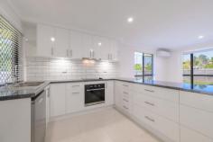  58 Col Brown Avenue Clinton QLD 4680 $739,000 Exciting New Listing: This beautifully renovated lowset brick home has 4 bedrooms, 2 bathrooms, double garage, and it offers all the modern comforts and style, and presents as a new home. Set on a large fully fenced corner block with a 12m x 9m shed, with a mezzanine floor, and a 4T Vehicle Hoist. Perfect for the home mechanic or car enthusiast, and ideal if you have a boat or caravan because there's plenty of side access. It's a move-in ready impressive home, just waiting for the lucky new owners to sit back and enjoy! Attention to detail is impeccable with the inside fully repainted, new lighting throughout, modern tiles, brand new kitchen, new bathrooms and fittings, and the entire home has brand new white blinds, and new air conditioners. So, when you step inside, the first reaction is, 'Wow' this is nice!! It's an open plan living, dining and kitchen area. The kitchen has a double sink, pantry, plenty of bench space, soft close drawers and cupboards, and an electric cooktop. There's even a coffee nook, or it can be a designated area for your jug and toaster. The Master bedroom is air conditioned and has a built-in robe, and an ensuite tiled to the ceiling, while the other 3 bedrooms are also air conditioned, with built-in robes, while the main bathroom has a separate shower & bath, tiled to the ceiling and a separate toilet. Some of the other features that this home has to offer is that there are security screens throughout, and no carpet either which is a bonus. There is plenty of room to add a swimming pool if desired later, and the home backs on to bushland so it's very private. Conveniently located just minutes from shopping centres, schools, the CBD, and popular restaurants. 